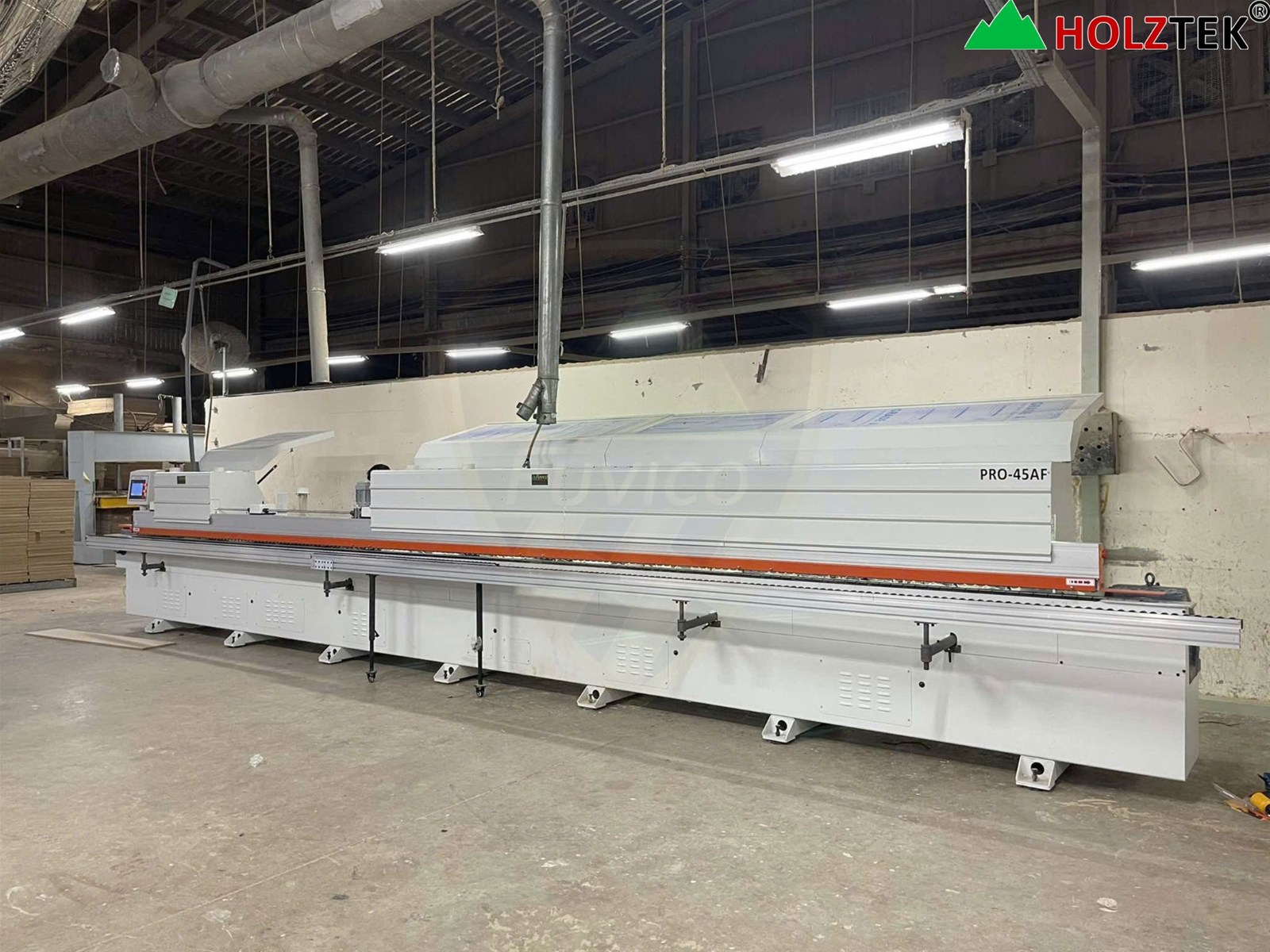 Máy dán cạnh vát 45 độ và 90 độ Holztek